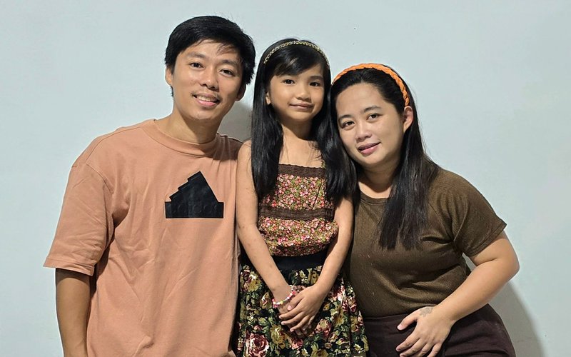 Fae Cabalbal and her family, customer of The Bible Story set, from Ilagan, Isabela